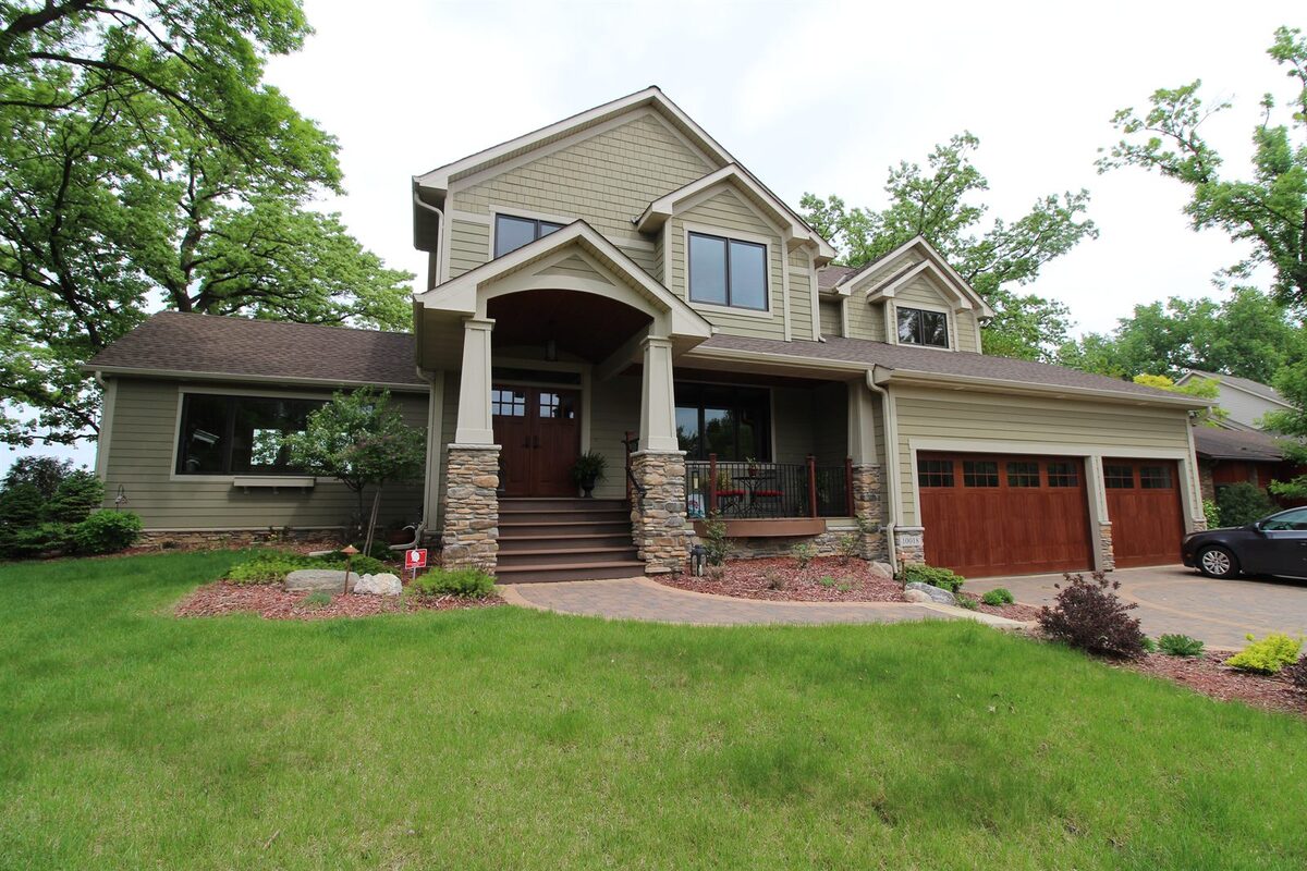 West Metro craftsman lake home exterior by Kuechle Construction Co.